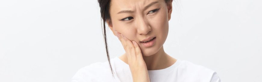 Флюс после удаления зуба: причины появления и способы лечения