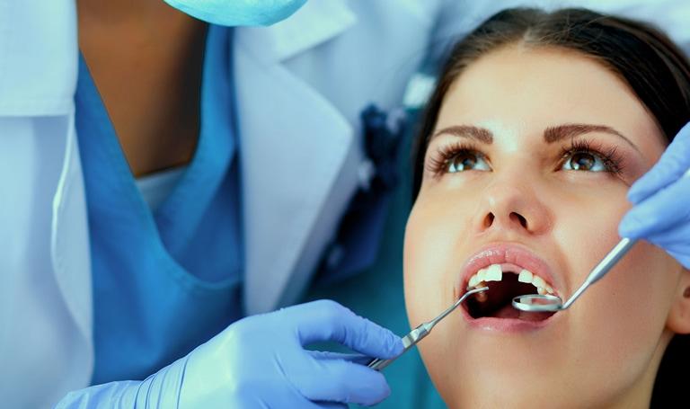 причины образования кисты на корне зуба