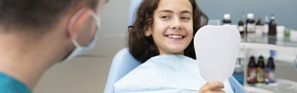 Зубы растут криво: причины проблемы и методы коррекции