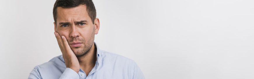Болят все зубы сразу: почему и что делать