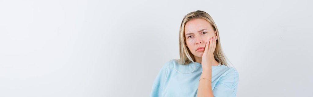 Отек после удаления зуба мудрости: сколько держится и как снять